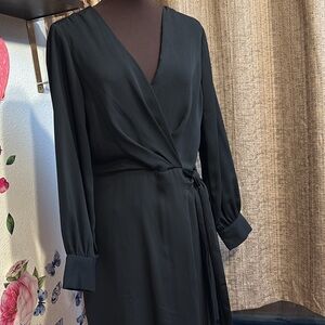Top Shop solid black long sleeve faux wrap mini dress. Size 6.